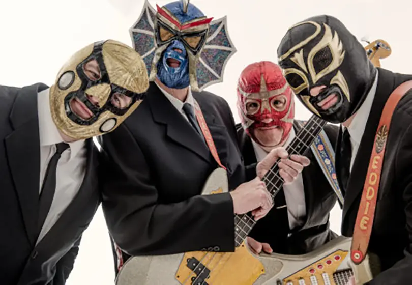 Masked and mysterious, Los Straitjackets channel the spirit of surf rock